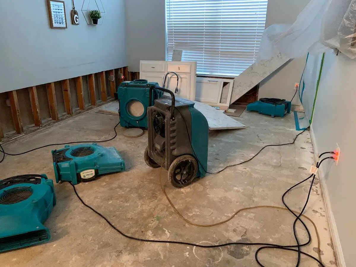 Dehumidifier in flood-cut room for Water Damage Restoration in Pomfret